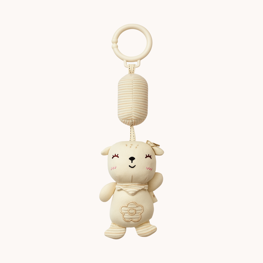 Lamb stroller toy attachable to a stroller on a white background